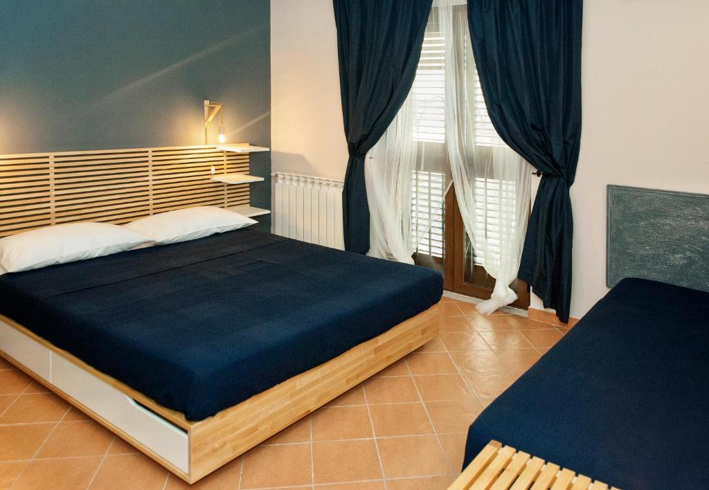 Postel nebo postele na pokoji v ubytování Casa Duci