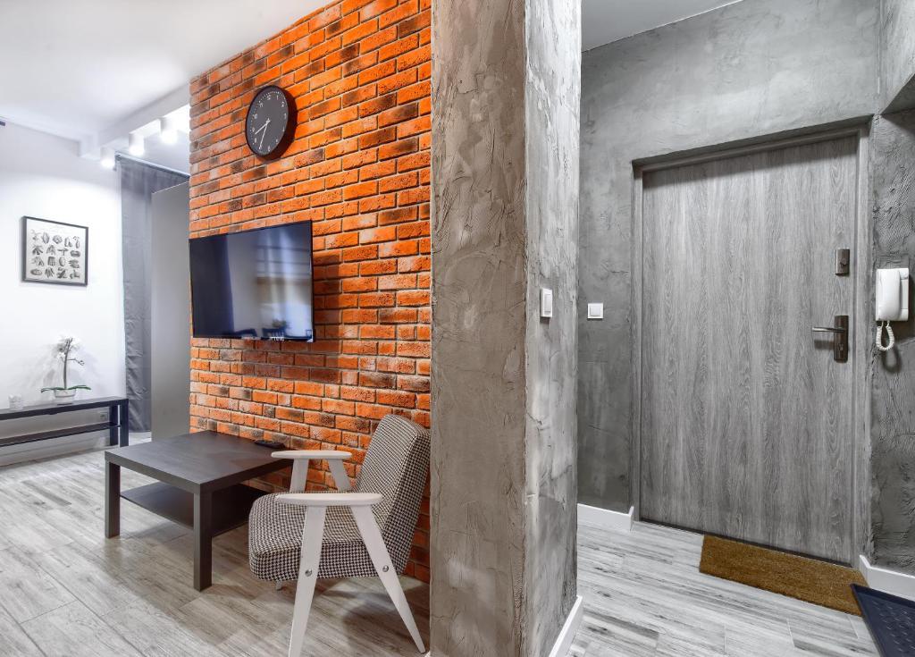 TV a/nebo společenská místnost v ubytování Mieszkanie MoLove - ACCO RENT