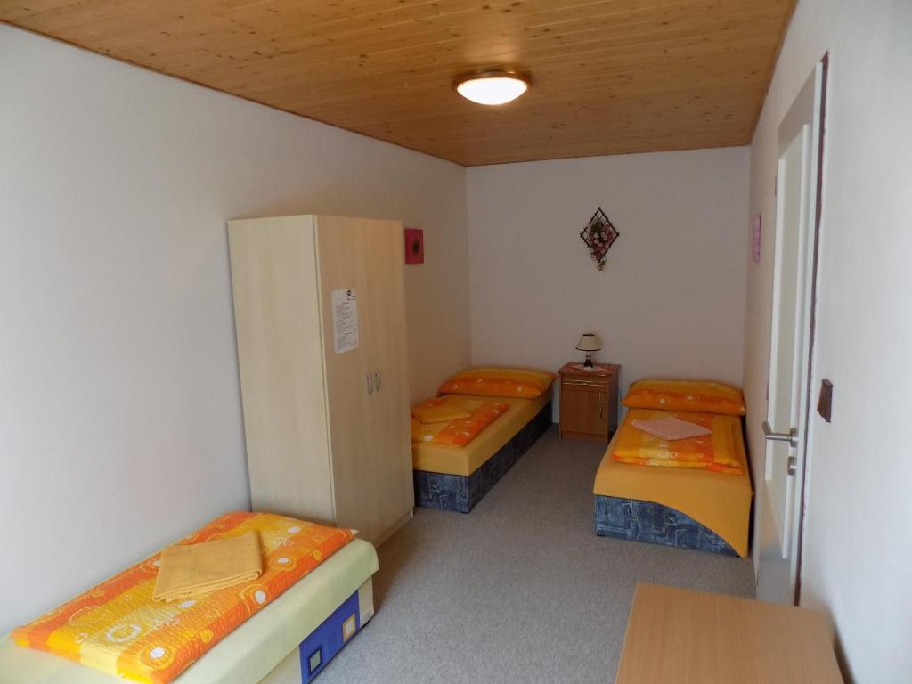 Postel nebo postele na pokoji v ubytování Ubytování Apartmány Ferenčíková