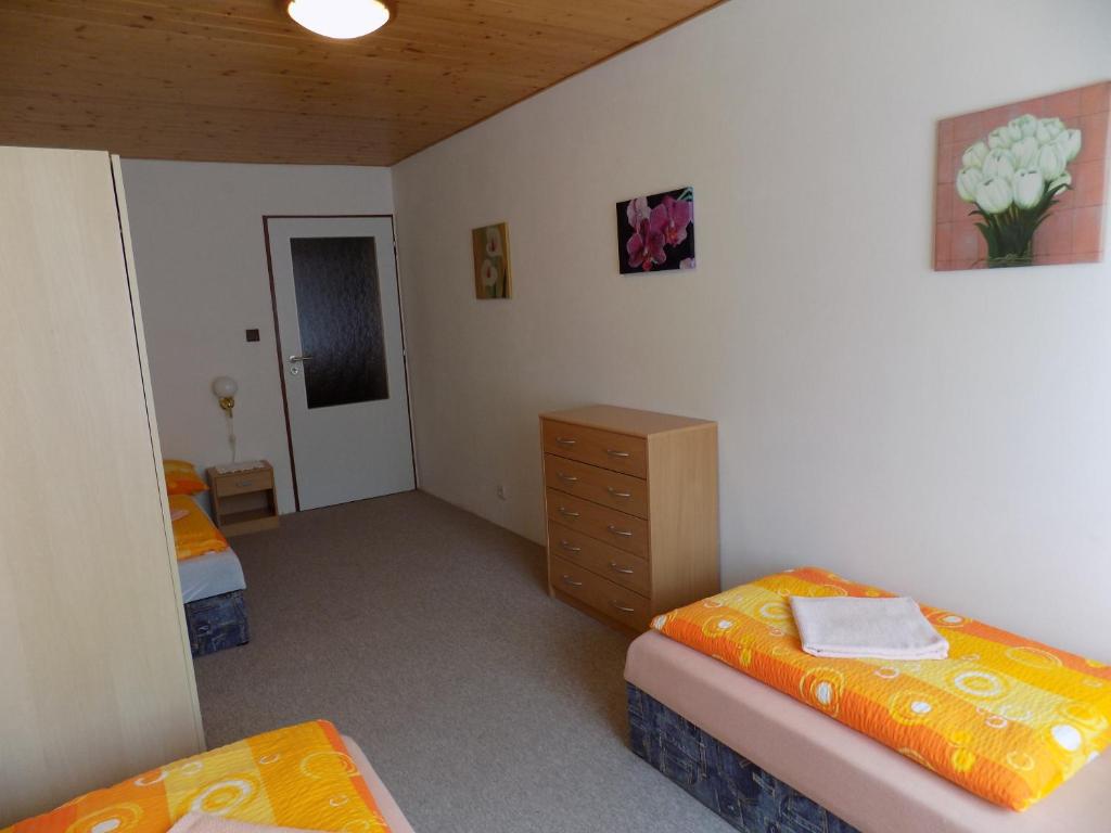 Postel nebo postele na pokoji v ubytování Ubytování Apartmány Ferenčíková
