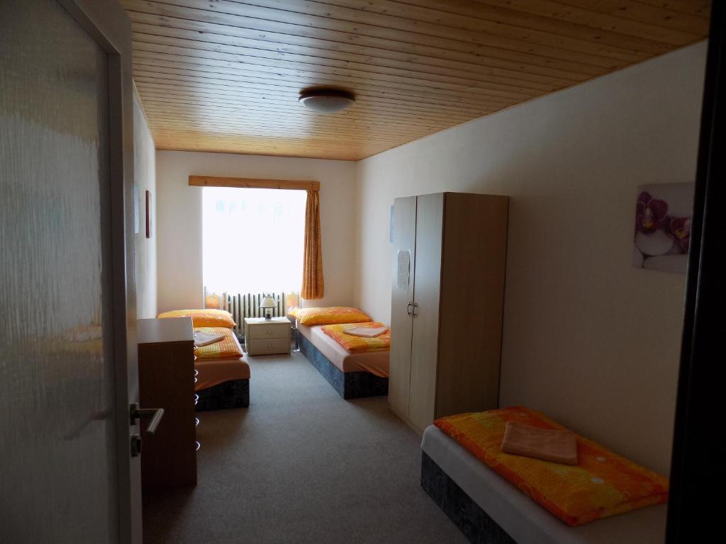 Postel nebo postele na pokoji v ubytování Ubytování Apartmány Ferenčíková