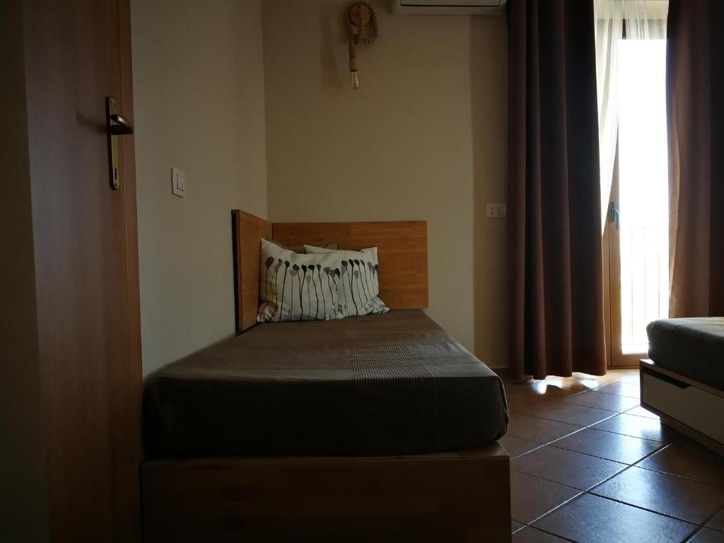 Postel nebo postele na pokoji v ubytování Casa Duci