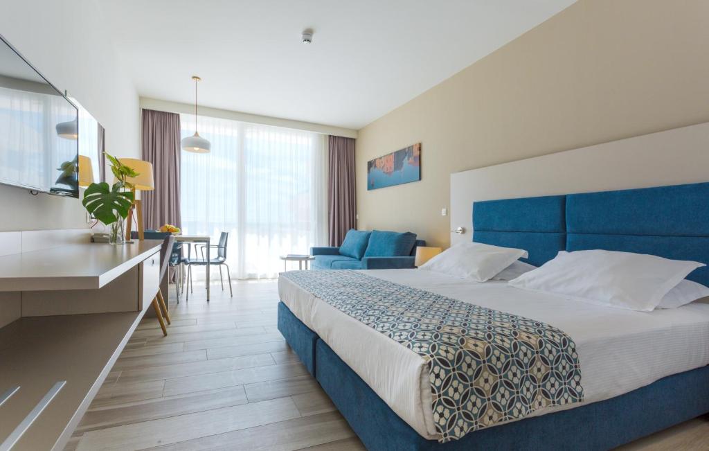 Posteľ alebo postele v izbe v ubytovaní Romana Beach Resort