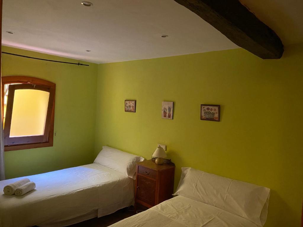 Cama o camas de una habitación en La Polaina