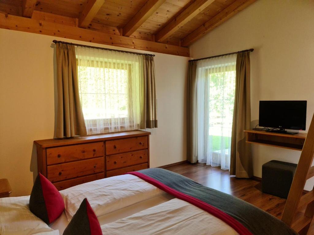Posteľ alebo postele v izbe v ubytovaní Das Resort Brixen