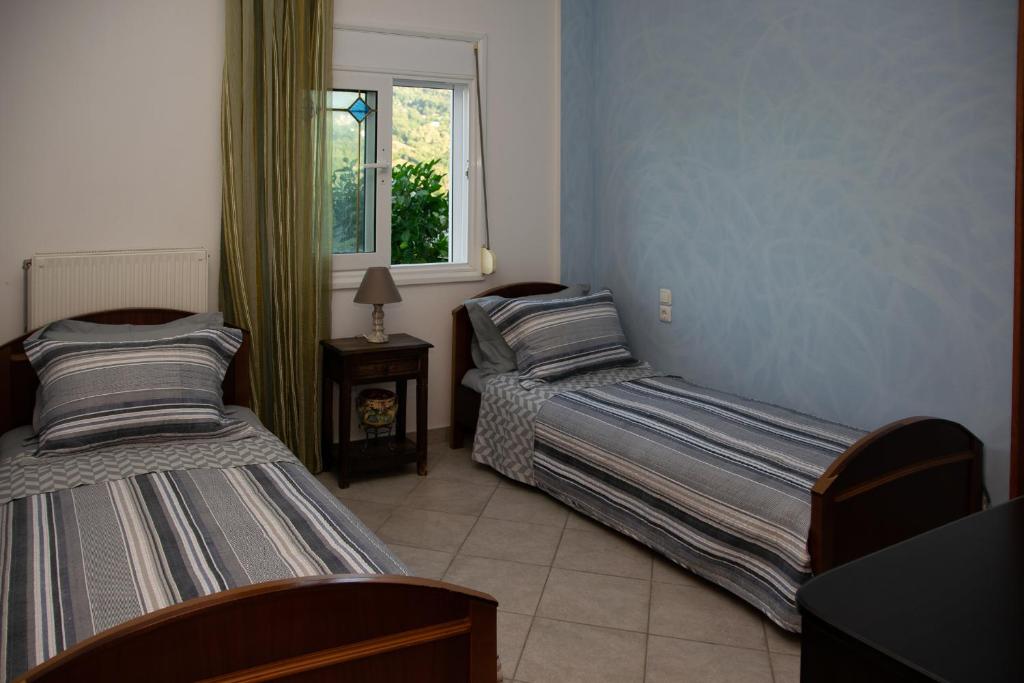 Postel nebo postele na pokoji v ubytování D & K Guest House