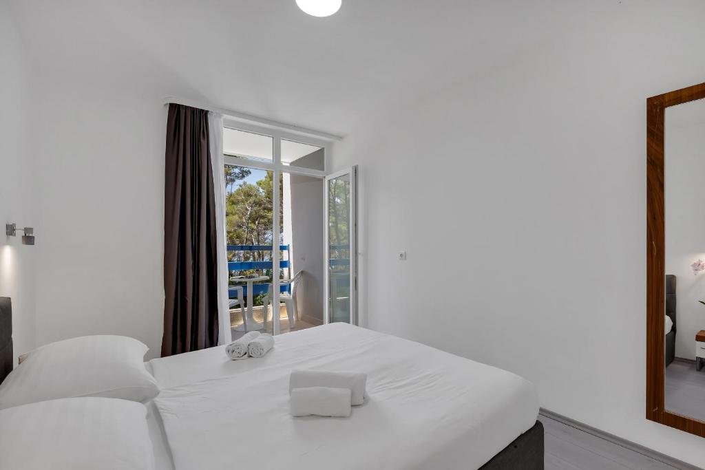 Krevet ili kreveti u jedinici u okviru objekta Hotel Alem