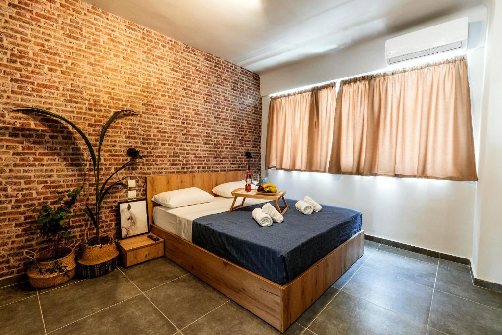 Postel nebo postele na pokoji v ubytování Unique Experience Apartment’s