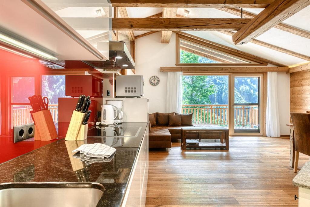A kitchen or kitchenette at Dahoam-Apartments by A-Appartments