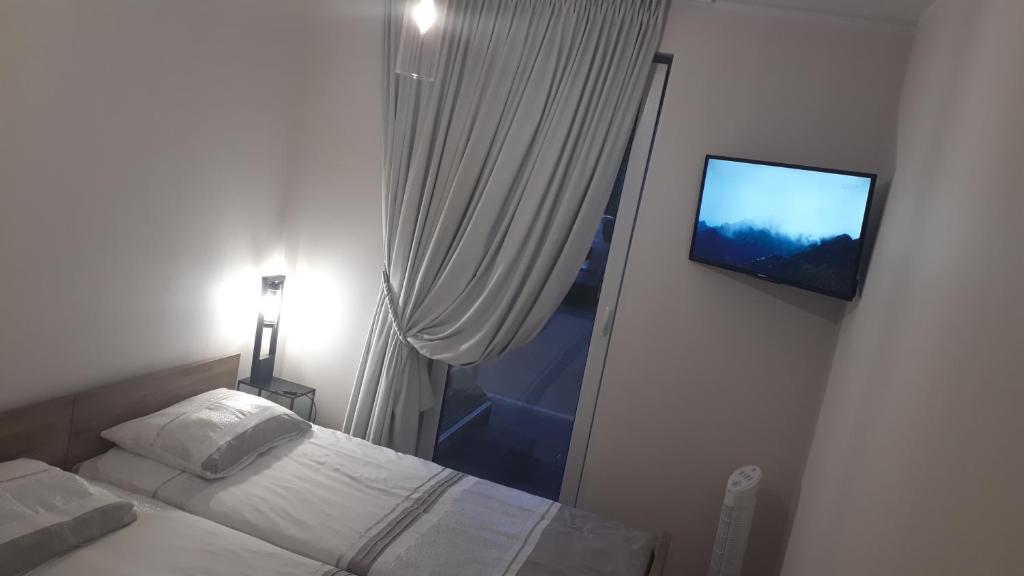 Posteľ alebo postele v izbe v ubytovaní Apartament Koszałka