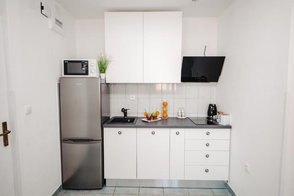 Kuchyňa alebo kuchynka v ubytovaní Studio apartmant Tonka
