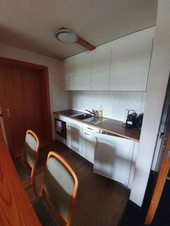 Kuchyňa alebo kuchynka v ubytovaní Aparthotel Ambassador