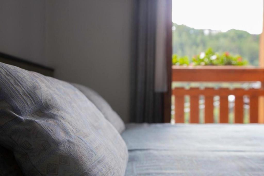 Postel nebo postele na pokoji v ubytování Hotel Moizi