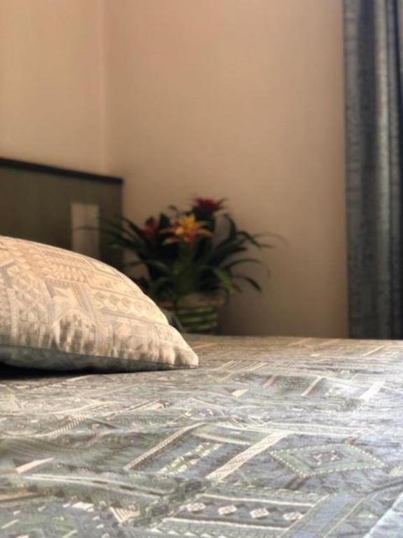 Postel nebo postele na pokoji v ubytování Hotel Moizi