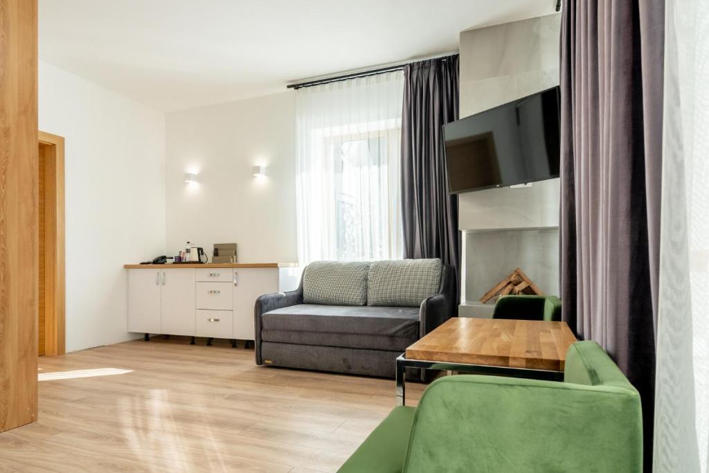 Posezení v ubytování Chalet Fomich