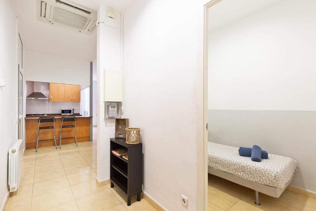 Posteľ alebo postele v izbe v ubytovaní Stay U-nique Apartments Urgell