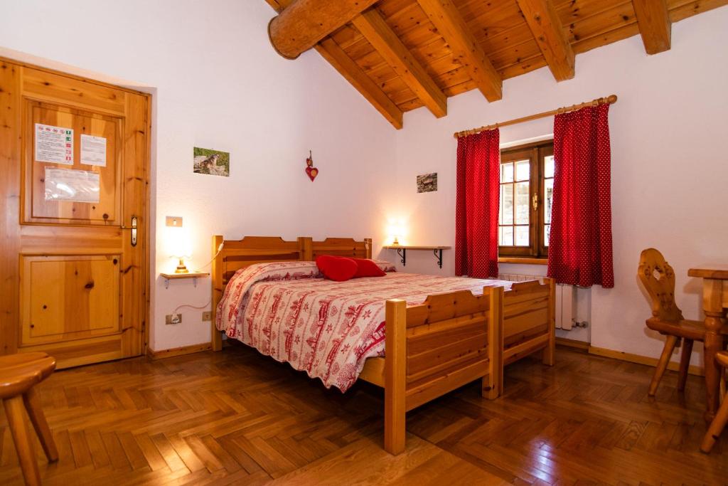 Postel nebo postele na pokoji v ubytování Lou Tsantelet