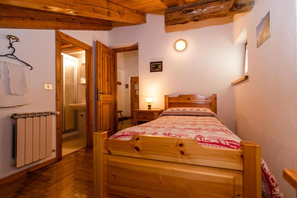 Postel nebo postele na pokoji v ubytování Lou Tsantelet
