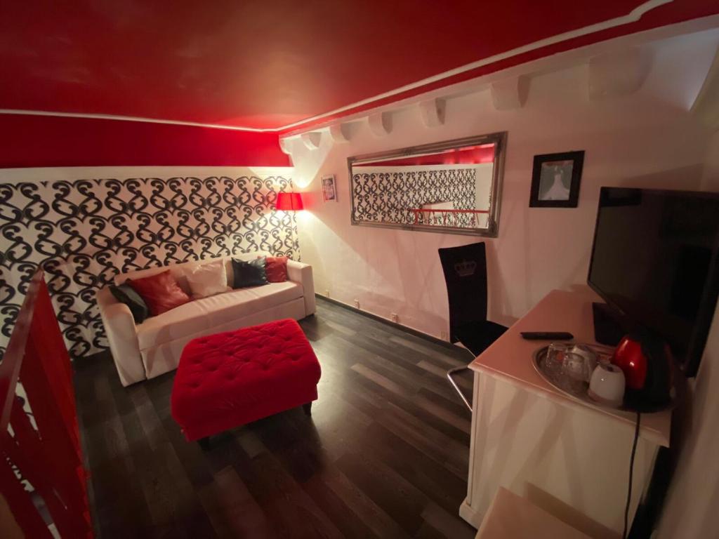 Televízia a/alebo spoločenská miestnosť v ubytovaní Bed&Breakfast Andio