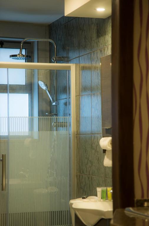 Koupelna v ubytování Shams Alweibdeh Hotel Apartments