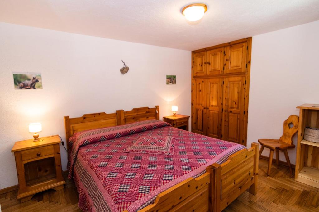 Postel nebo postele na pokoji v ubytování Lou Tsantelet