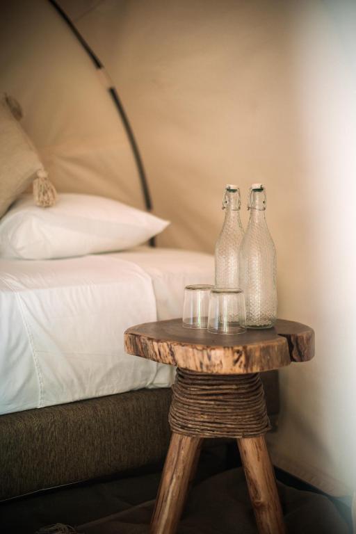 Postel nebo postele na pokoji v ubytování Uman Glamping & Cenote Tulum