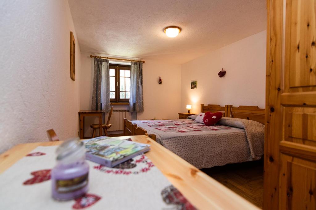 Postel nebo postele na pokoji v ubytování Lou Tsantelet