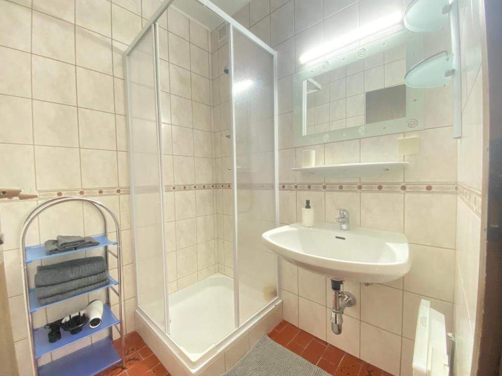 Kúpeľňa v ubytovaní Velden Living Apartments - Schiefling Panorama
