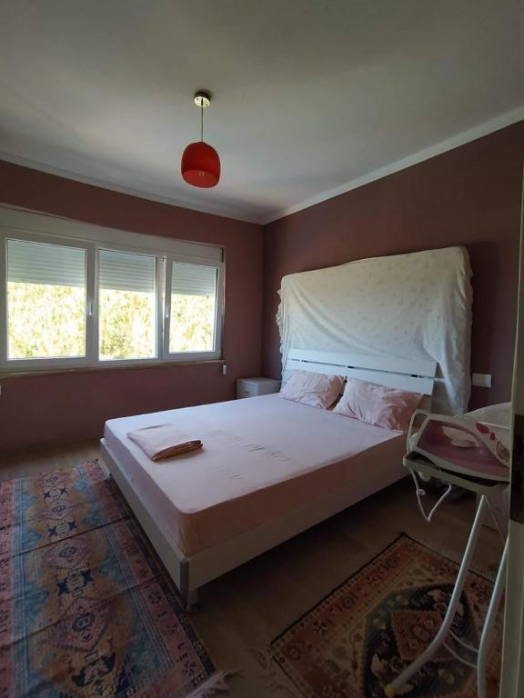 Posteľ alebo postele v izbe v ubytovaní Mia's Sea View Apartment
