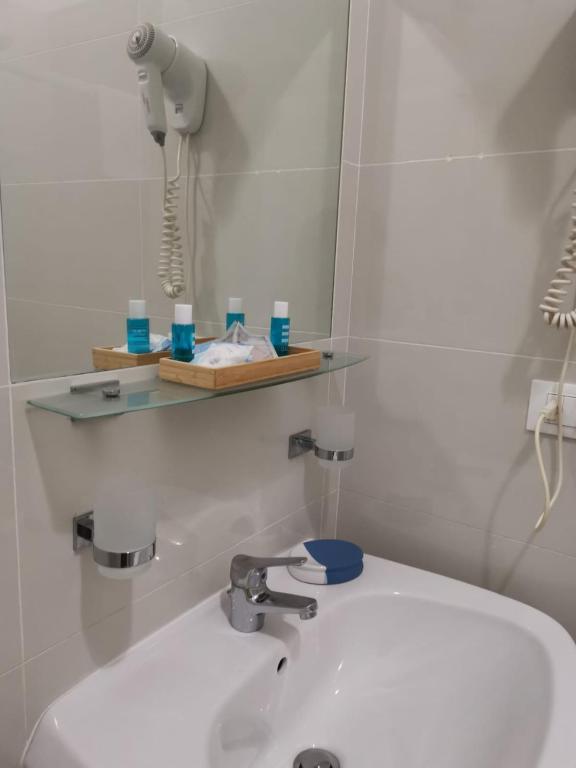 Kúpeľňa v ubytovaní Al porticciolo