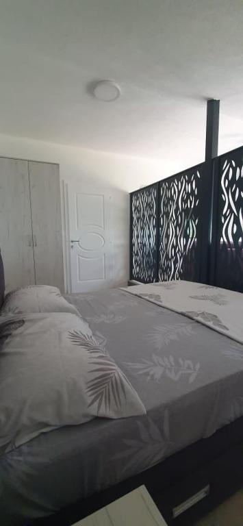 Postel nebo postele na pokoji v ubytování Apartmani Kaldrma