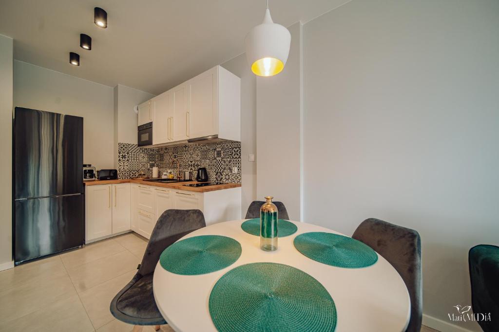Kuchyňa alebo kuchynka v ubytovaní Apartament Silence Karpatia Resort Nefryt