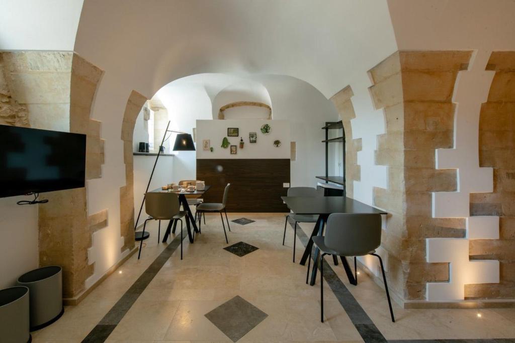 TV a/nebo společenská místnost v ubytování IBLA ROOMS