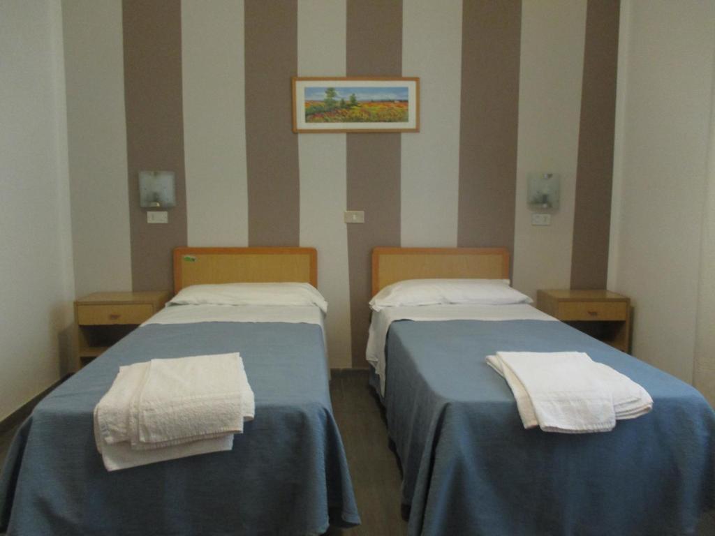 Postel nebo postele na pokoji v ubytování Hotel Abamar