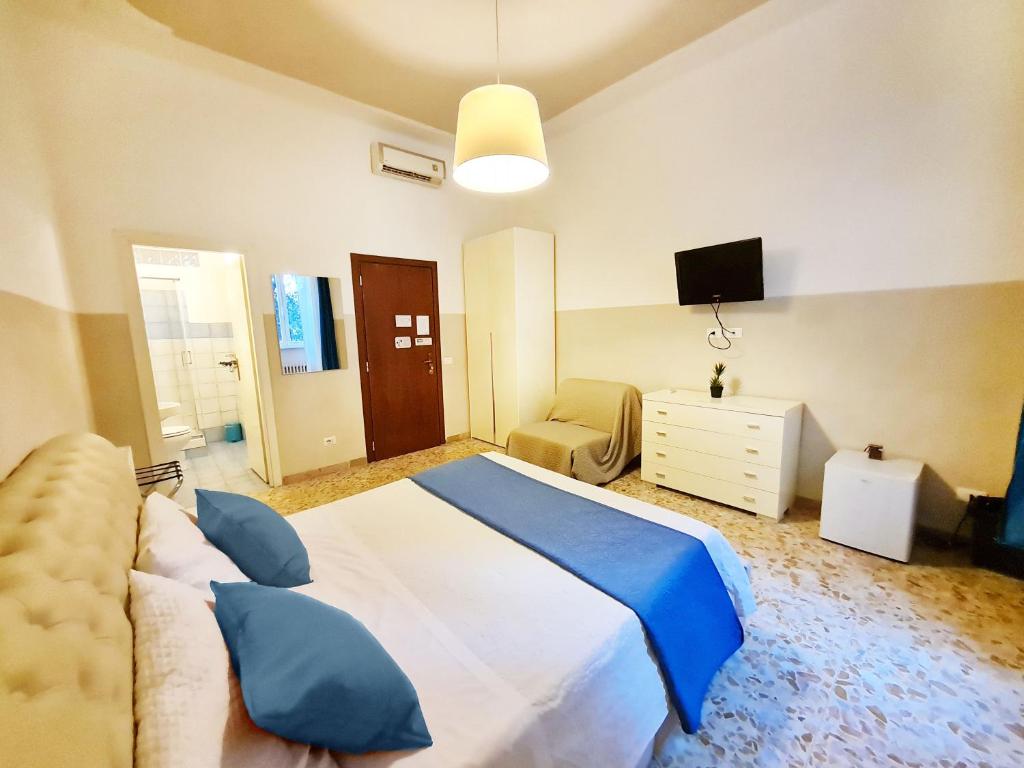 Łóżko lub łóżka w pokoju w obiekcie Sweet Life Guesthouse