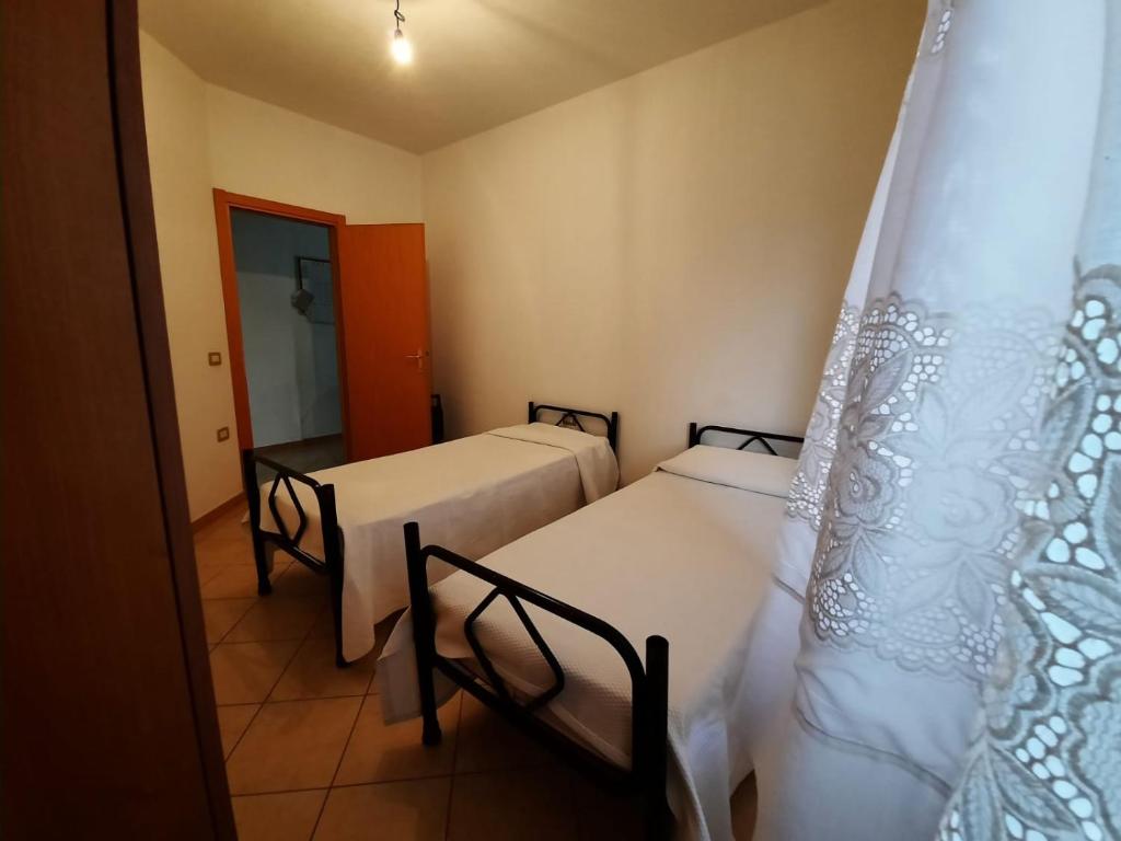 Postel nebo postele na pokoji v ubytování Domo Vèdele