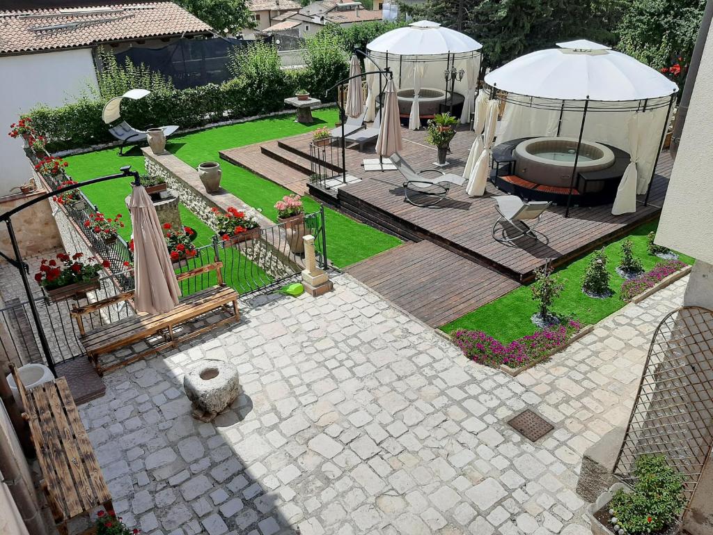 an aerial view of a backyard with a gazebo at B&B Palazzo La Loggia in Barisciano