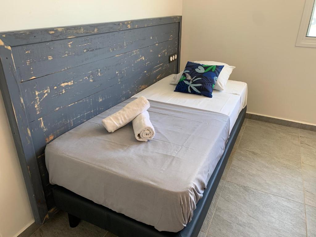 Postel nebo postele na pokoji v ubytování Karaibes Residence