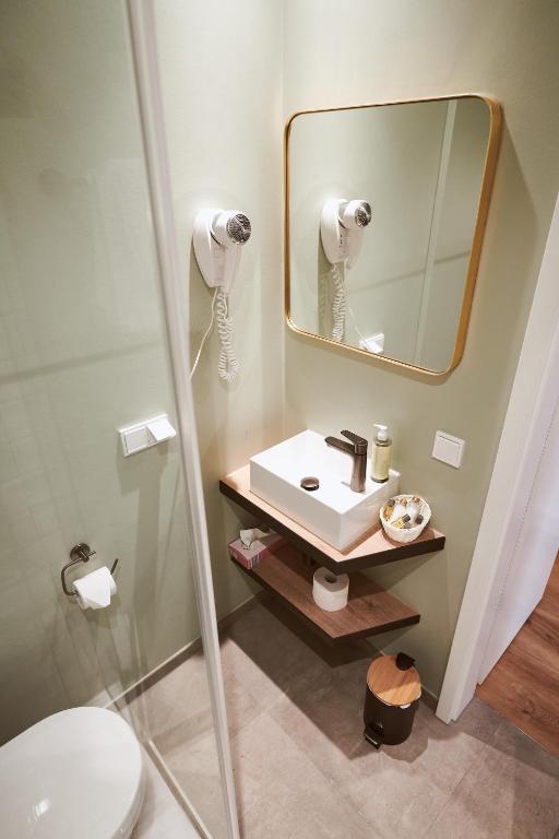 Koupelna v ubytování Gutshotel Baron Knyphausen
