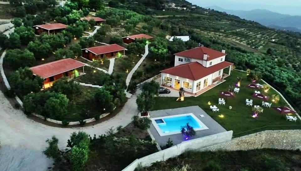 an aerial view of a house with a swimming pool at Agroturizem Bylis in Hekal