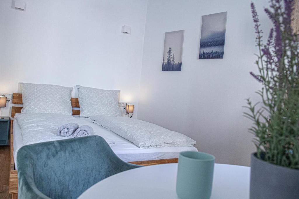 Кровать или кровати в номере Apartment Kabinett Zell