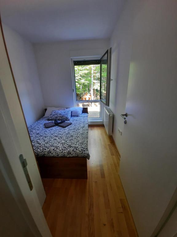 Krevet ili kreveti u jedinici u okviru objekta Apartman Divčigora A3