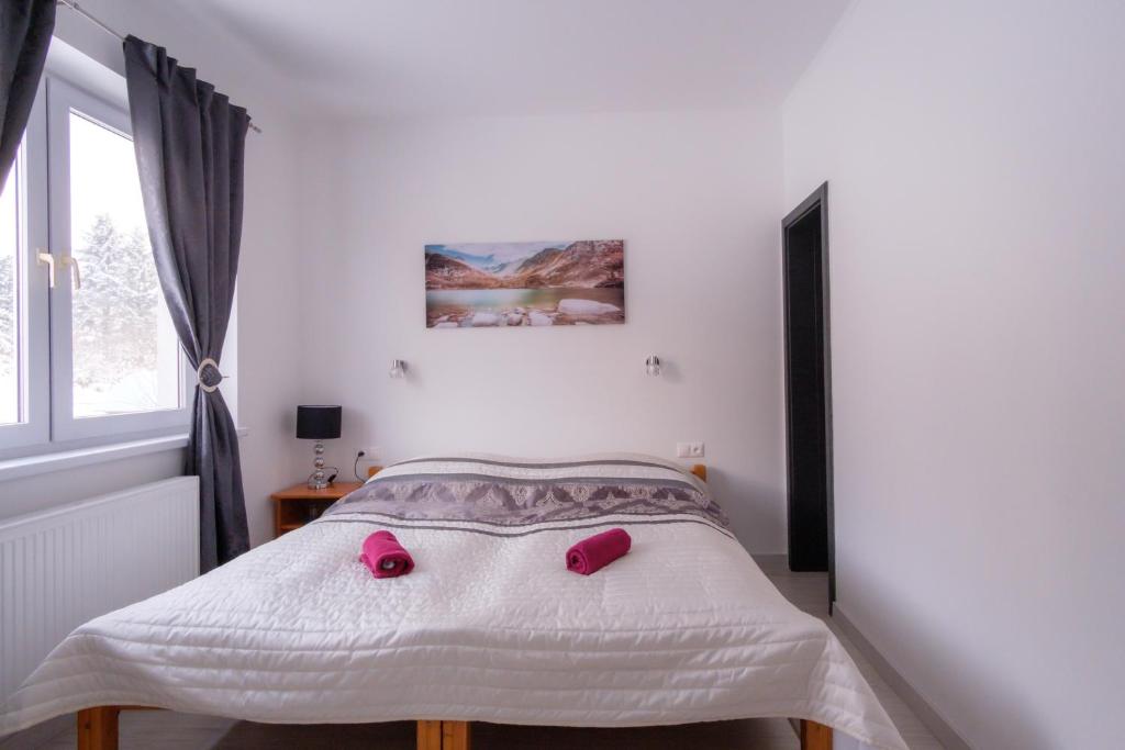 Postel nebo postele na pokoji v ubytování Villa Zarra
