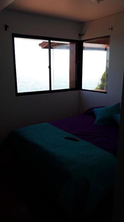 Postel nebo postele na pokoji v ubytování Hotel Terrazas Del Mar