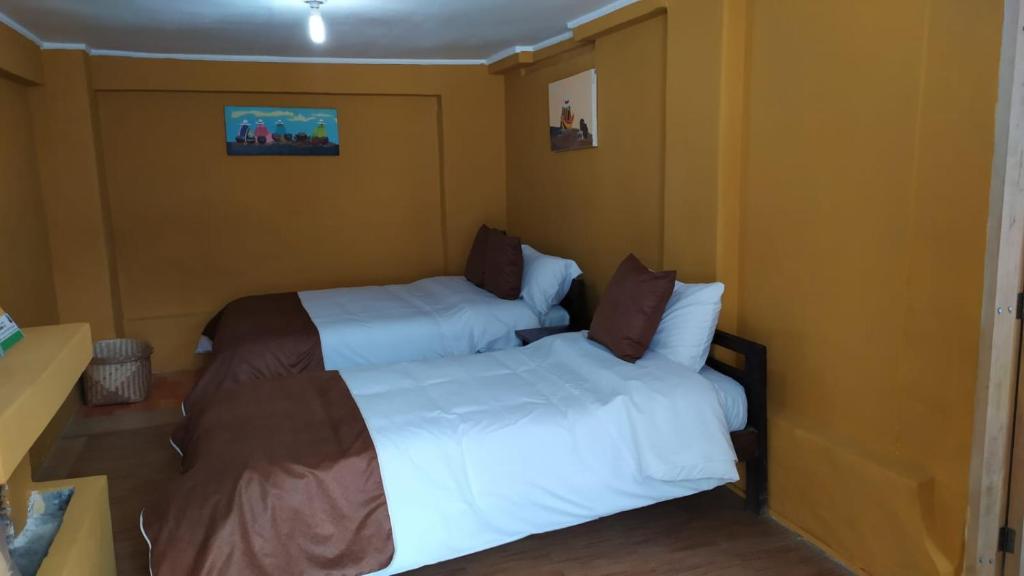 Postel nebo postele na pokoji v ubytování Galapagos Natural Life Hostel