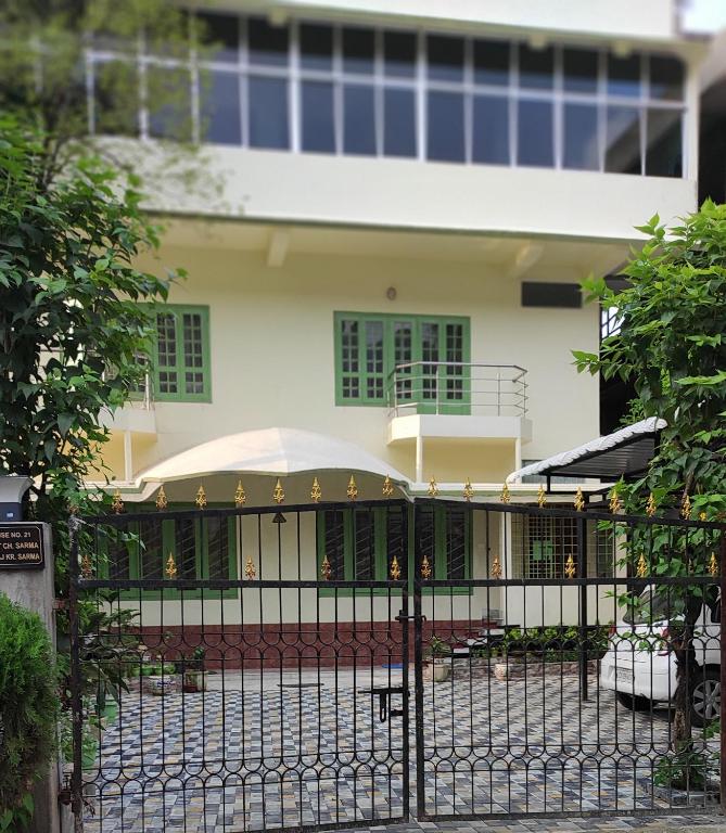 a black fence in front of a house at ALPANEST - Near GMCH and B Barooah Cancer in Guwahati
