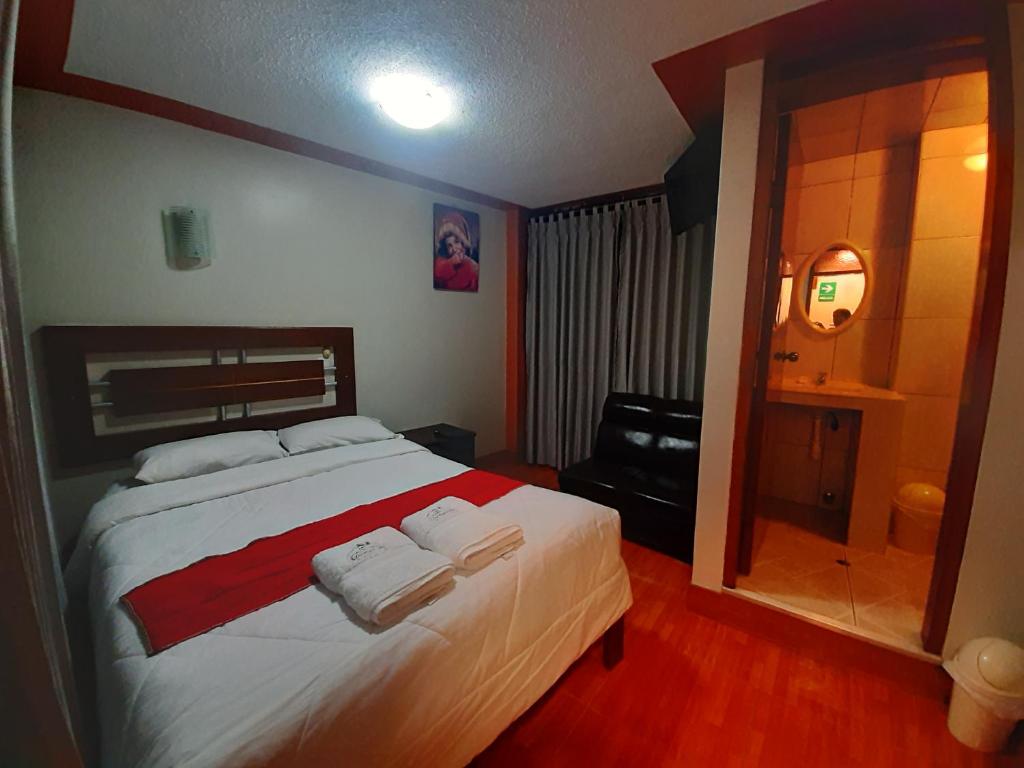 Cama ou camas em um quarto em Machupicchu Lodging