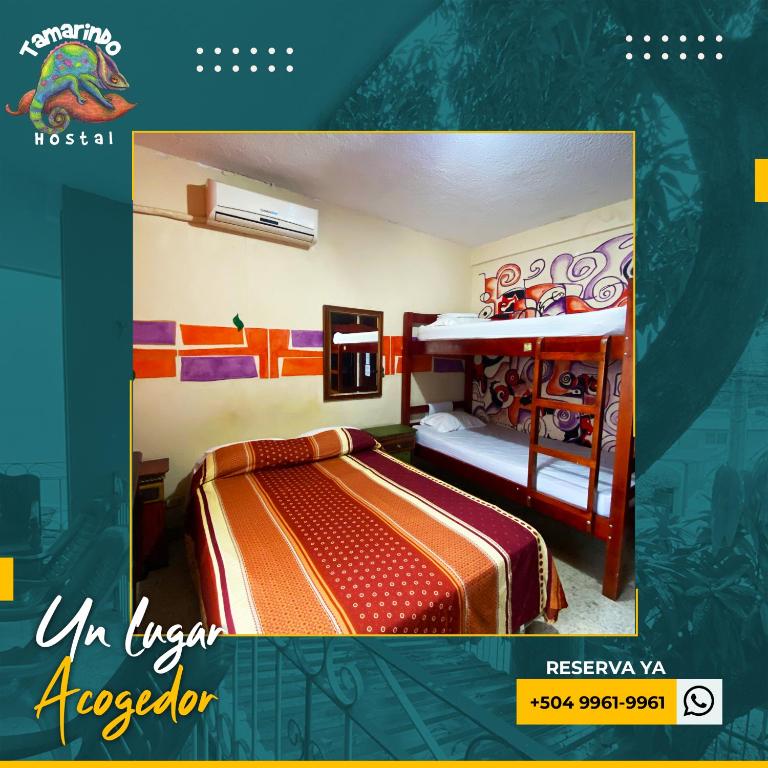 Postel nebo postele na pokoji v ubytování Tamarindo Hostel