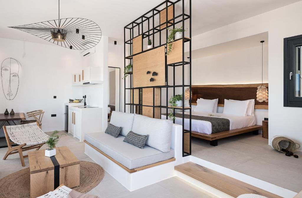 Postel nebo postele na pokoji v ubytování Athina Milos Suites