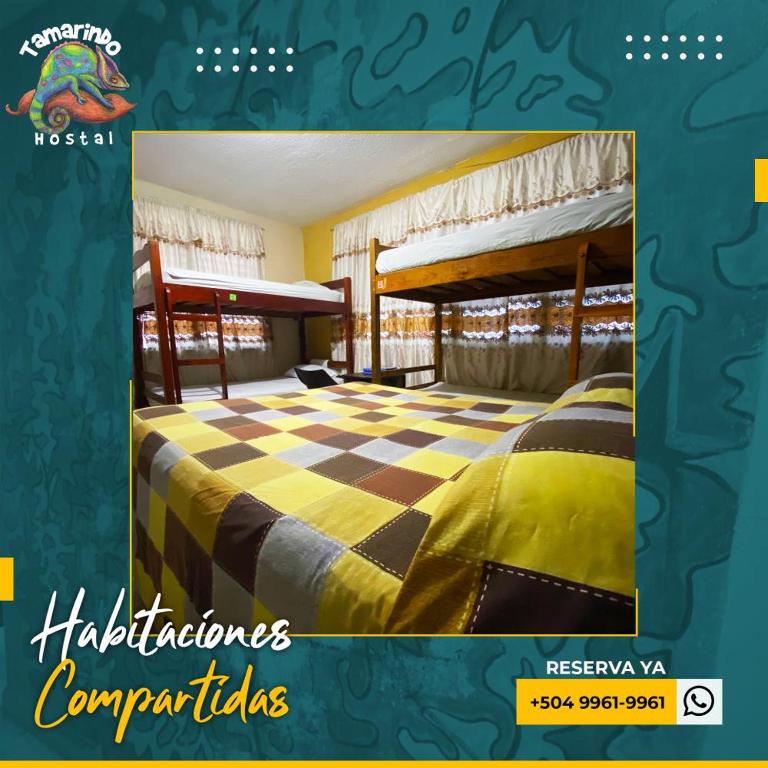 Postel nebo postele na pokoji v ubytování Tamarindo Hostel